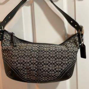 COACH signature shoulder bag.